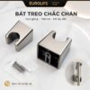 Bát gác vòi xịt Eurolife EL-X11-V kèm hai tắc kê và ốc vít, giúp treo tay xịt gọn gàng.