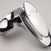 Hình ảnh cận cảnh bề mặt mạ Chrome sáng bóng của vòi lavabo nóng lạnh 2 chân Eurolife EL-CAM 03, thiết kế bo cong mềm mại, thuộc combo sen tắm nóng lạnh Eurolife CAM 03.
