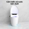 EL-SM8059B mở nắp với hiệu ứng vòng sáng xanh quanh chân bồn, minh họa cảm biến xả nước bên dưới