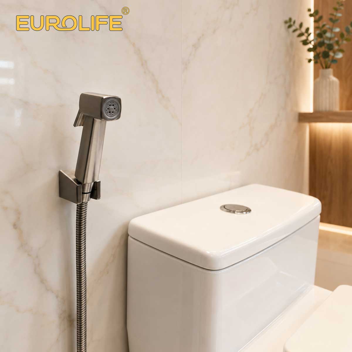 Bộ vòi xịt Eurolife EL-X11-V màu Niken được lắp cạnh bồn cầu trong không gian phòng tắm hiện đại.