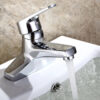 Hình ảnh vòi lavabo nóng lạnh 2 chân Eurolife EL-IRIS 03 lắp đặt thực tế trên chậu lavabo 2 lỗ, thể hiện đầu vòi tạo bọt, dòng nước êm và bề mặt mạ Chrome sáng bóng.