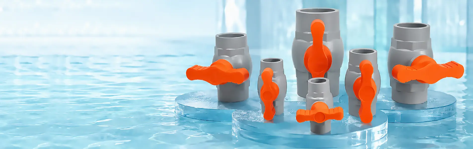 Sáu van bi nhựa uPVC thân đúc Eurolife màu xám, tay vặn cam đặt trên bục trong suốt giữa mặt nước xanh