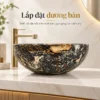 Chậu lavabo đá cuội tròn Eurolife LVB-DTR4040 lắp đặt dương bàn trên mặt đá sáng phối vòi vàng đồng